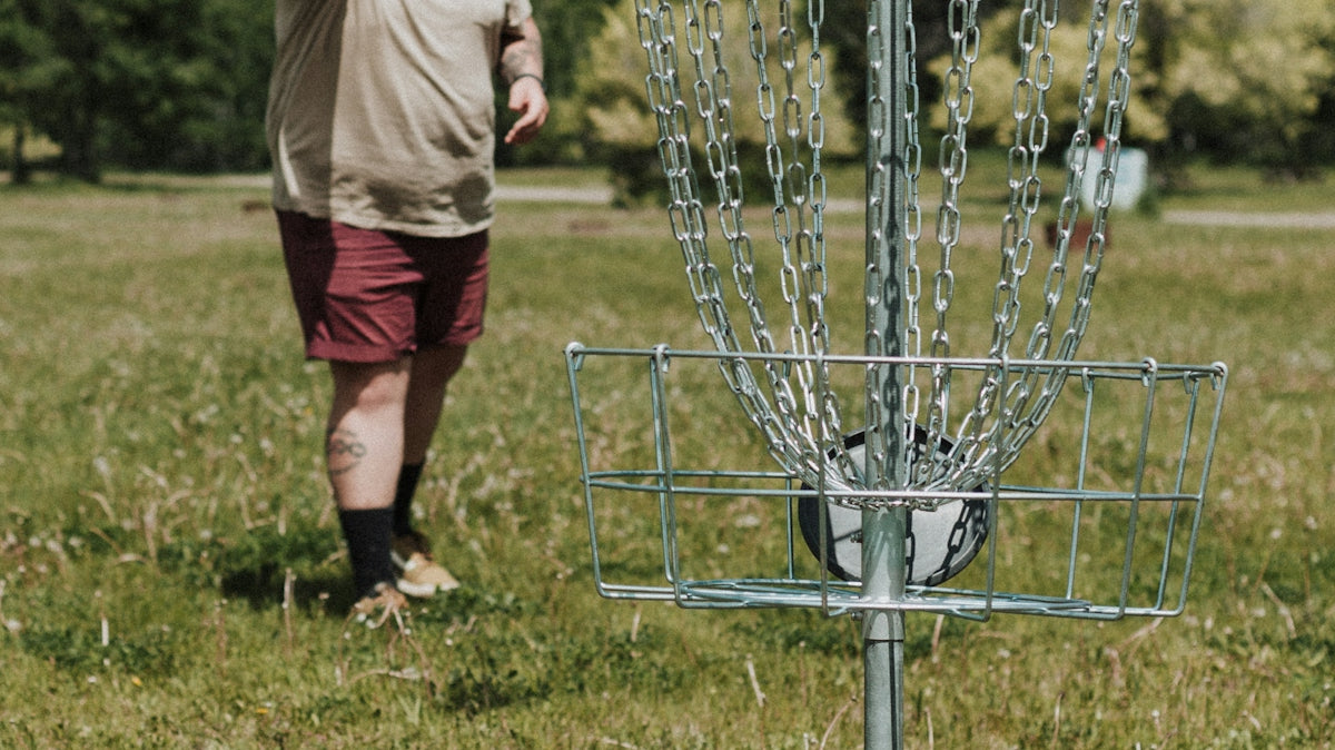 a person throwing a frisbee