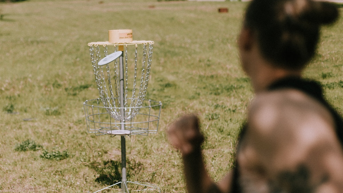 a person is looking at a bird feeder