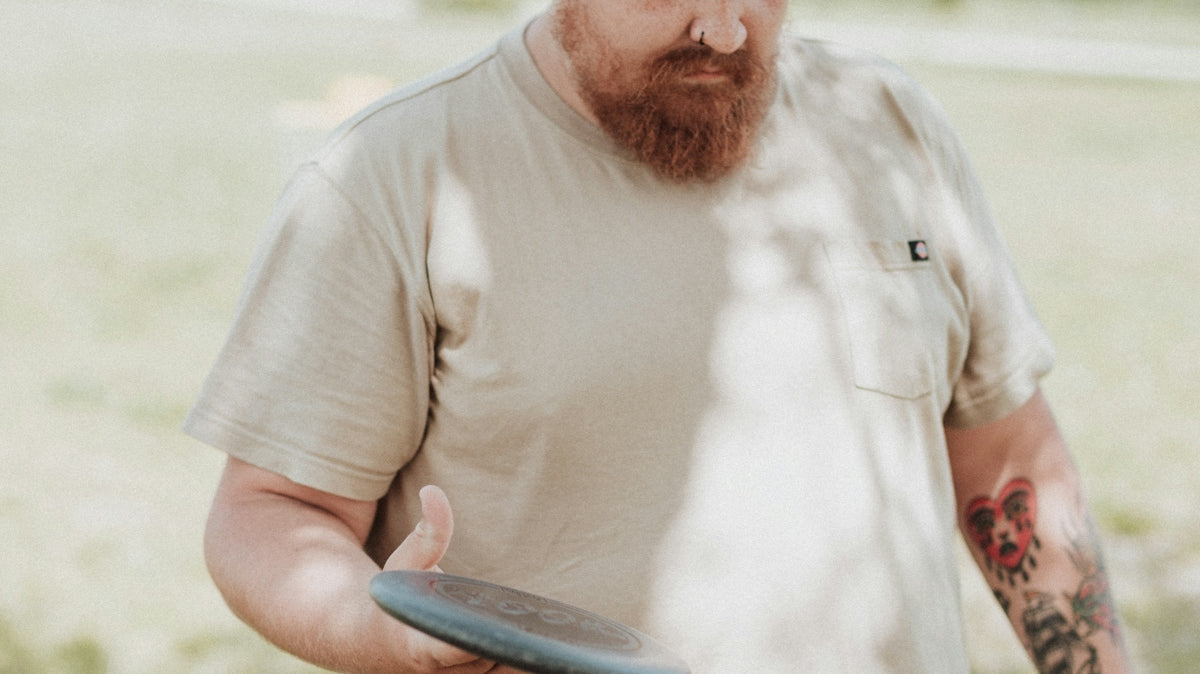 a man holding a frisbee