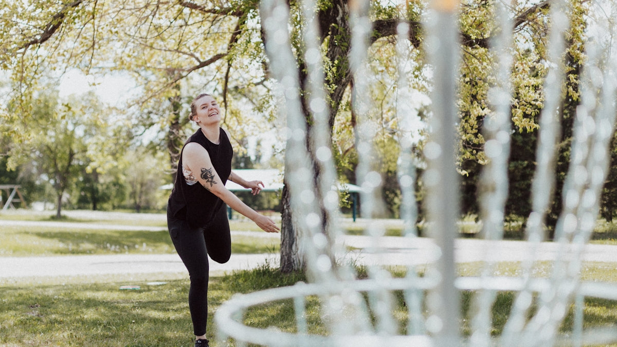 a woman posing in a park