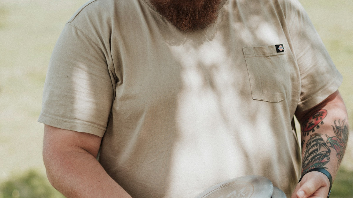 a man holding a frisbee