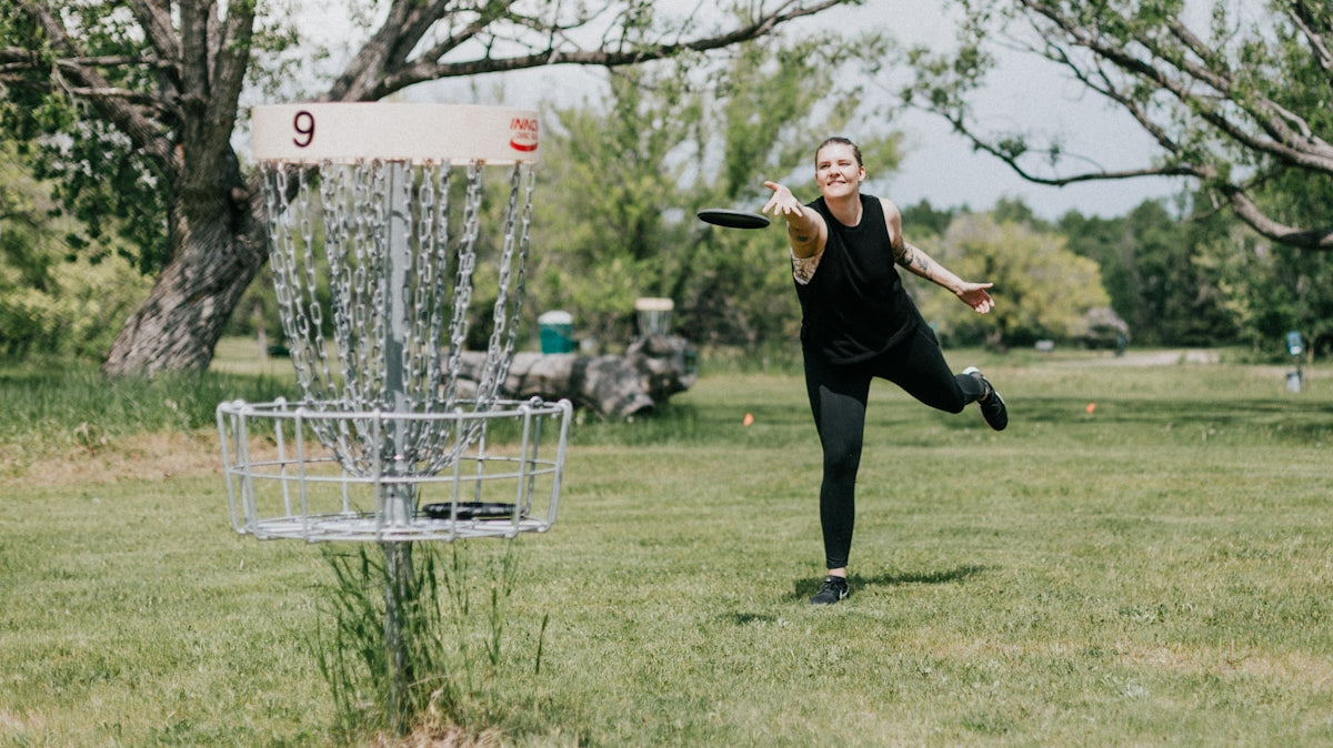 a person throwing a frisbee