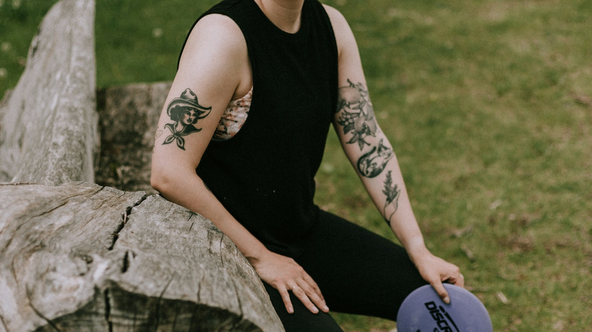 a person sitting on a log