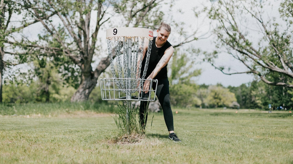 a man holding a shopping cart