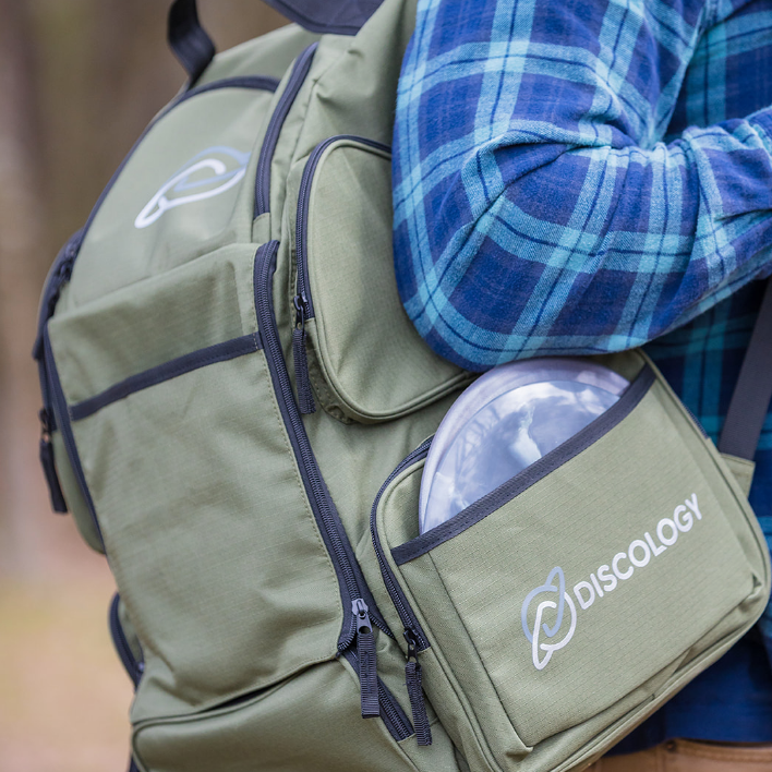 Discology Disc Golf IZZO Bag - Disc Golf Backpack - 26+ Disc Capacity - Large Storage Capacity - Durable, Water and Tear Resistant - Gotta Go Gotta Throw