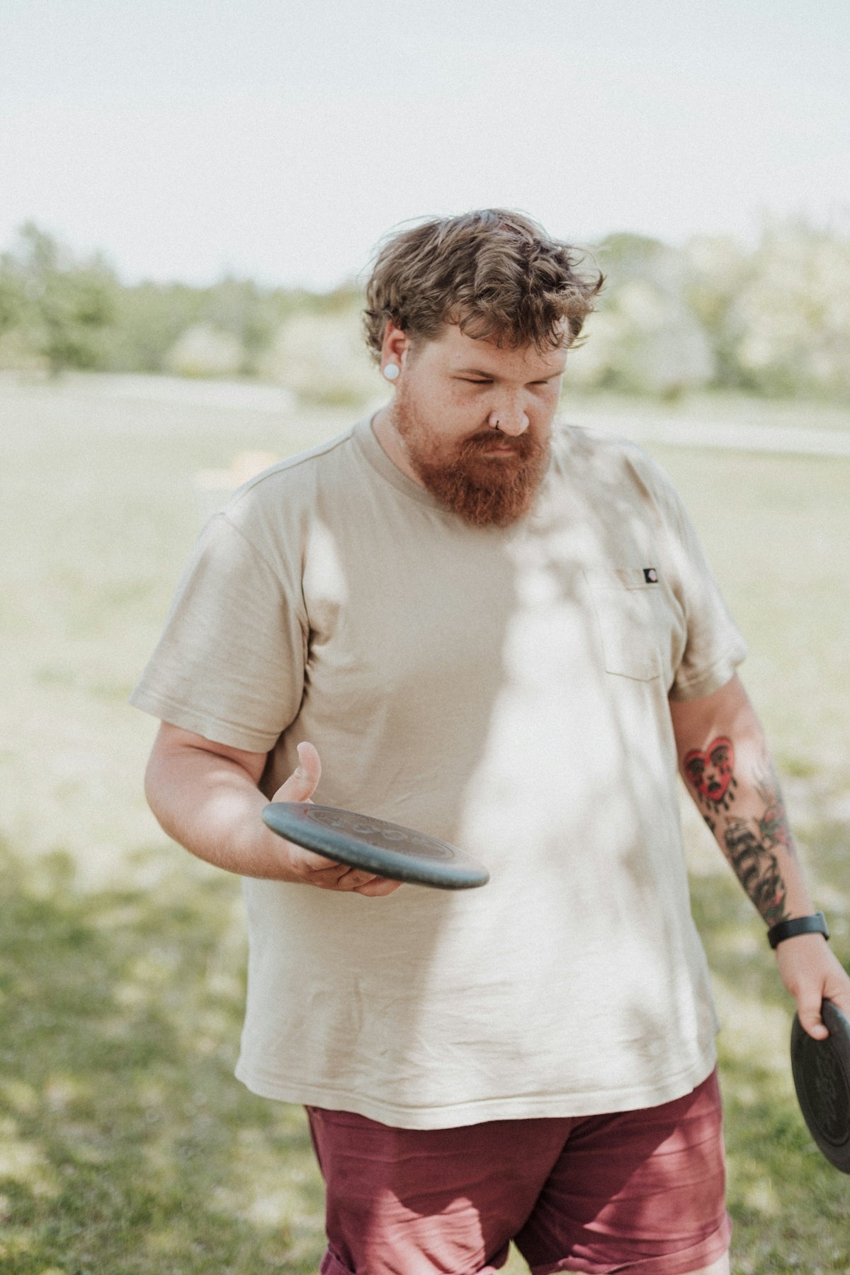 a man holding a frisbee